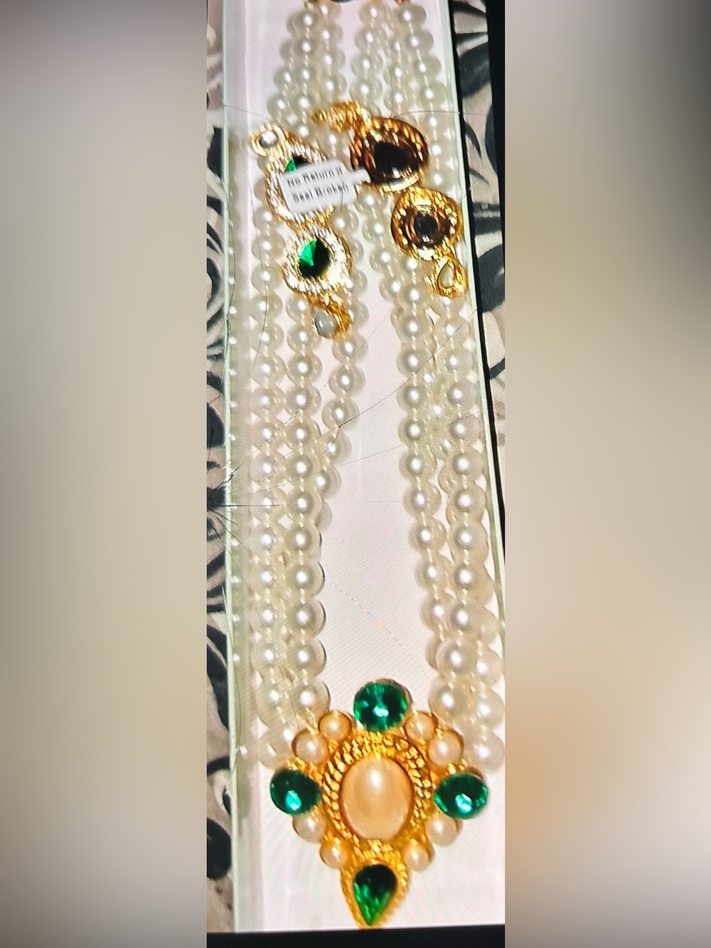 Elegant White Pearl Necklace with Green Gem Accent